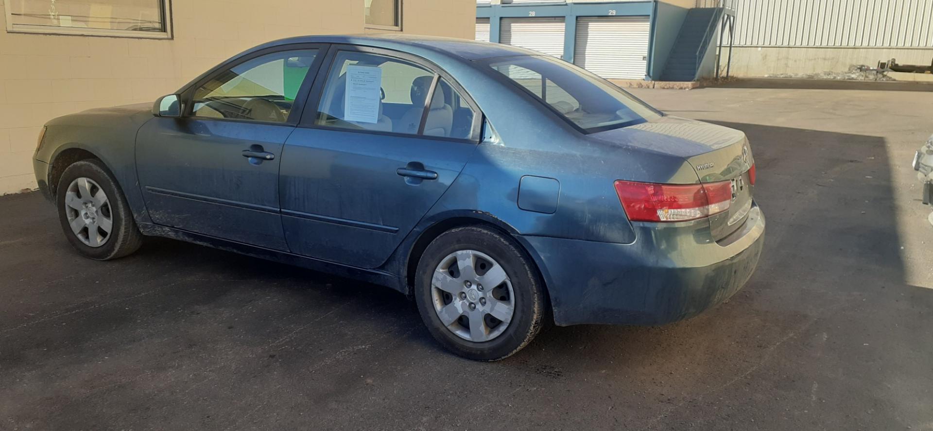 2006 Hyundai Sonata (KMHET46C36A) with an L4, 2.4L engine, 5-Speed Manual transmission, located at 2015 Cambell Street, Rapid City, SD, 57701, (605) 342-8326, 44.066433, -103.191772 - CARFAX AVAILABLE - Photo#5